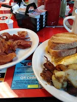 3 Cheese Omelette with Italian Bread Toast Home Fries and Side of Thick Cut Bacon