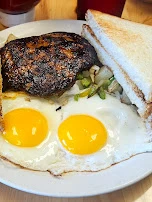 Two Egg Breakfast with Sausage and Fries